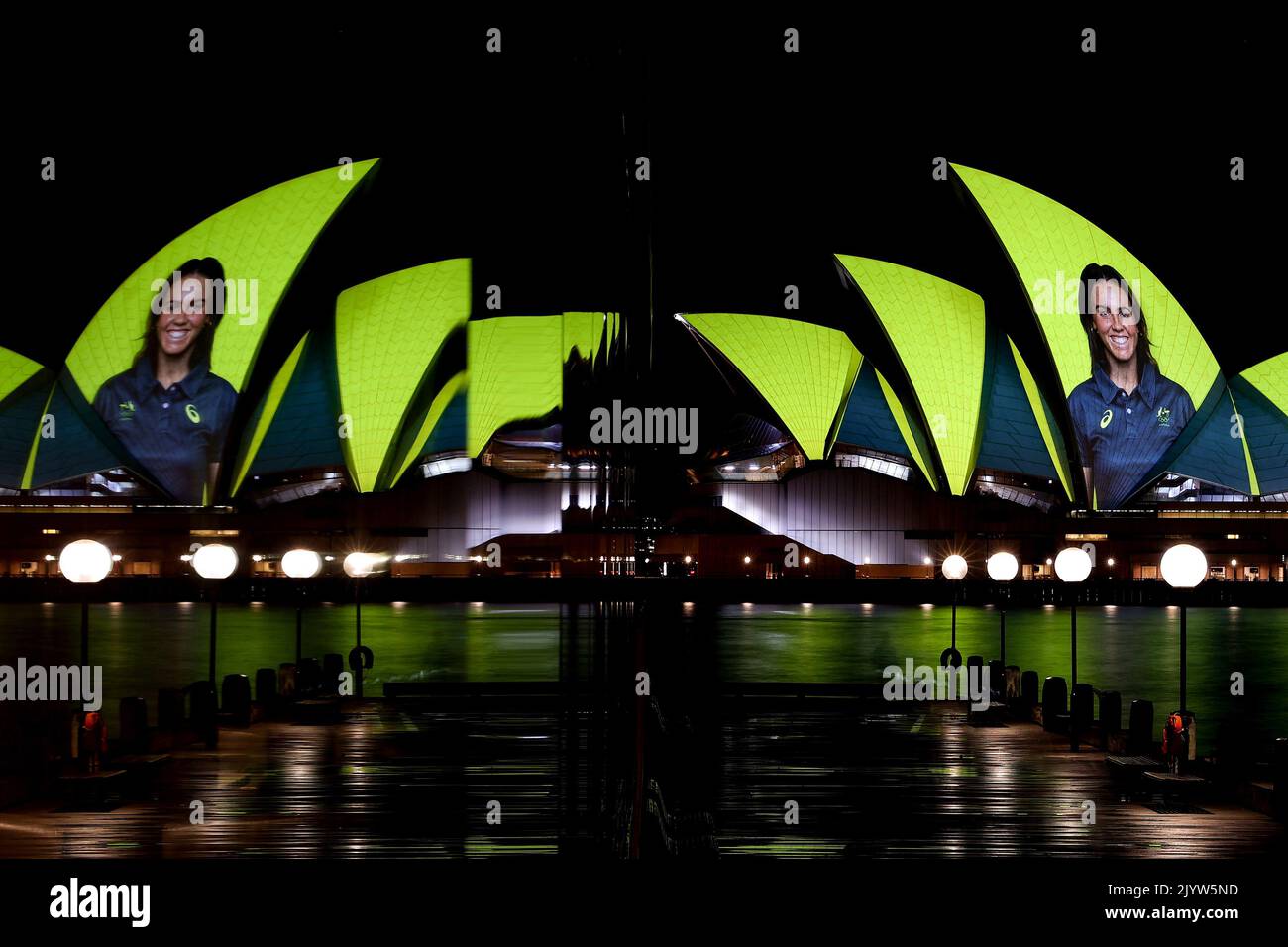 Images of Australian Olympians and Paralympians are projected onto the ...