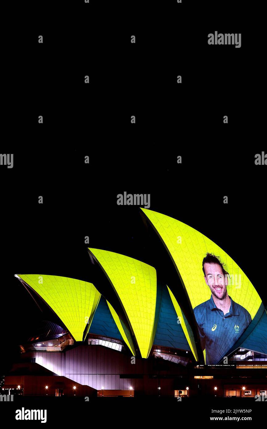 Images of Australian Olympians and Paralympians are projected onto the ...