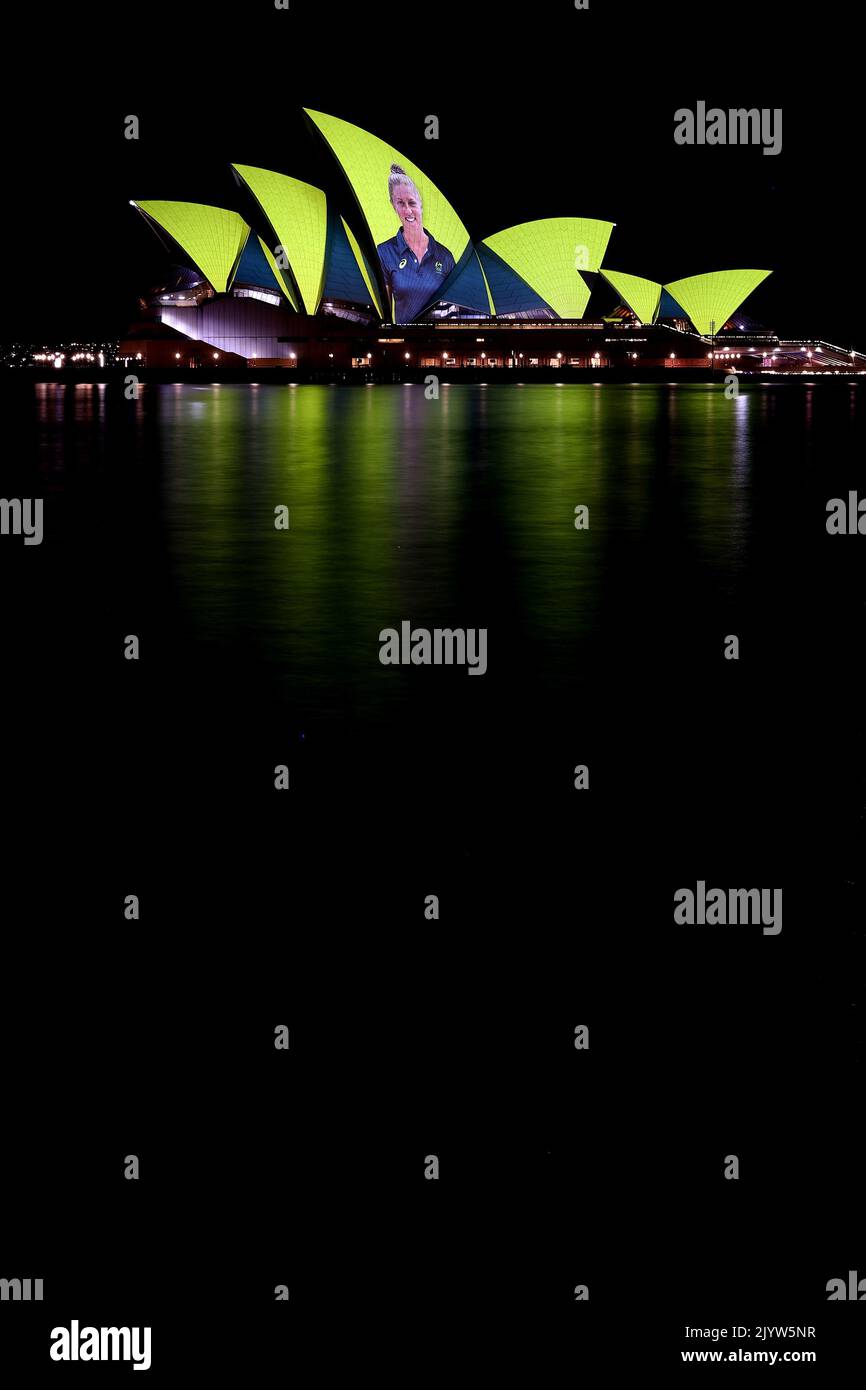 Images of Australian Olympians and Paralympians are projected onto the ...