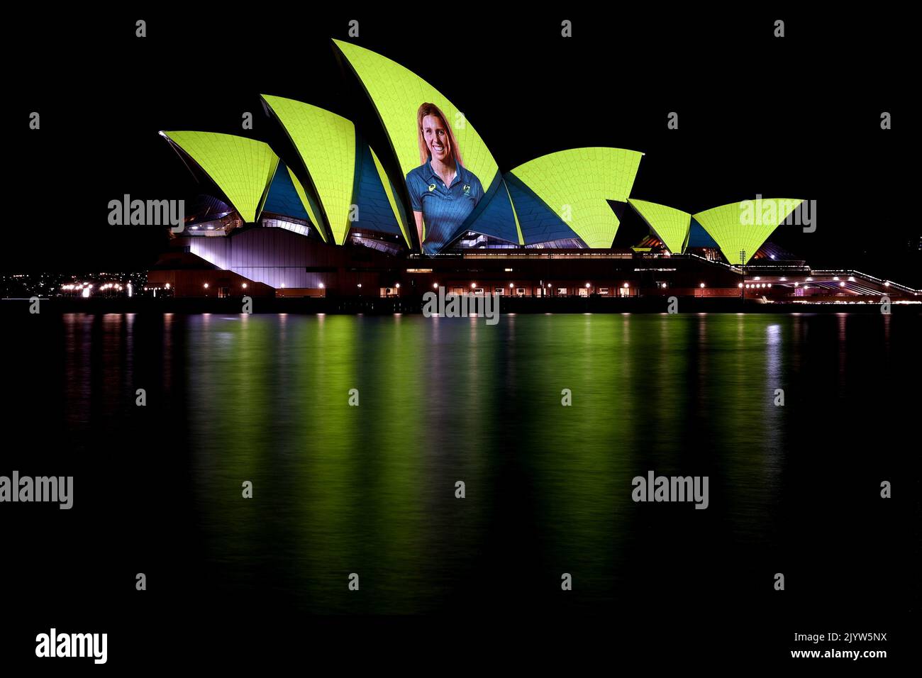 Images of Australian Olympians and Paralympians are projected onto the ...
