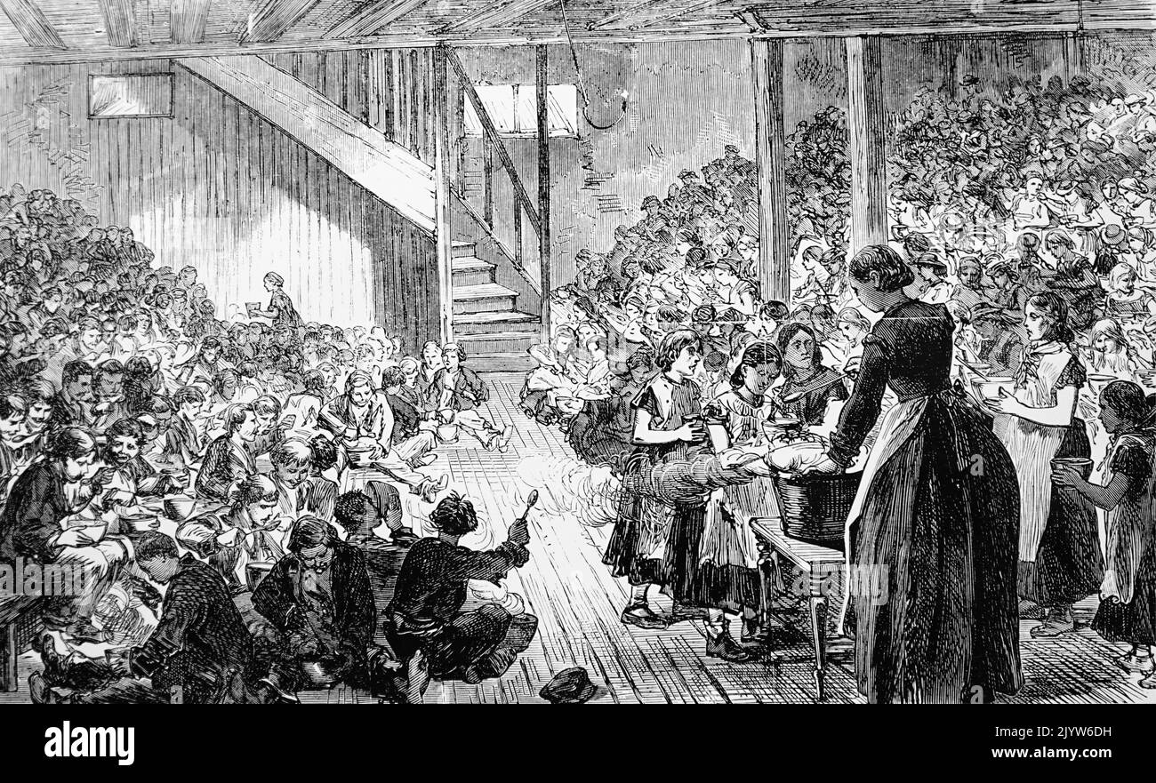 Illustration depicting children at the Clare Market Ragged School, St Clement Danes, being given their weekly free dinner. Dated 19th Century Stock Photo