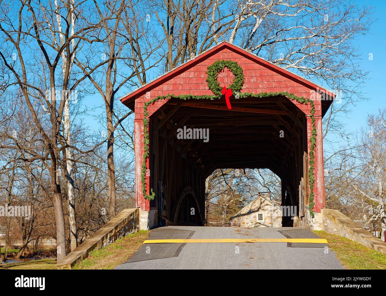 Poole Forge Covered Bridge, 1859, red, Christmas decoration, Conestoga Creek, Burr-Truss, antique, Caernarvon Township, USA, Lancaster County, PA, wi Stock Photo