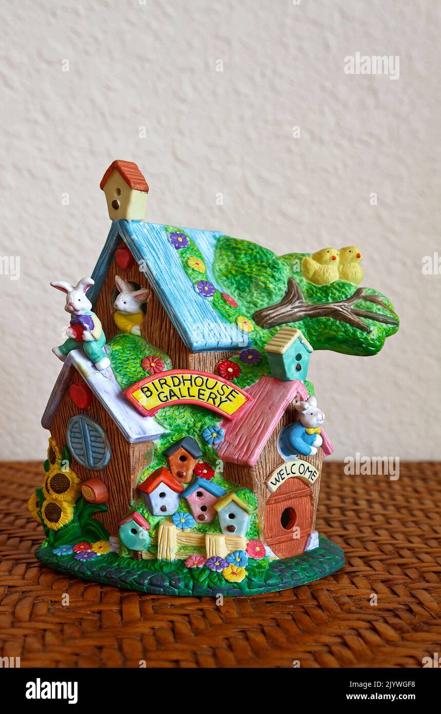 whimsical ceramic building, Birdhouse Gallery, rabbits, ducks, flowers, birdhouses, spring, decoration, colorful Stock Photo