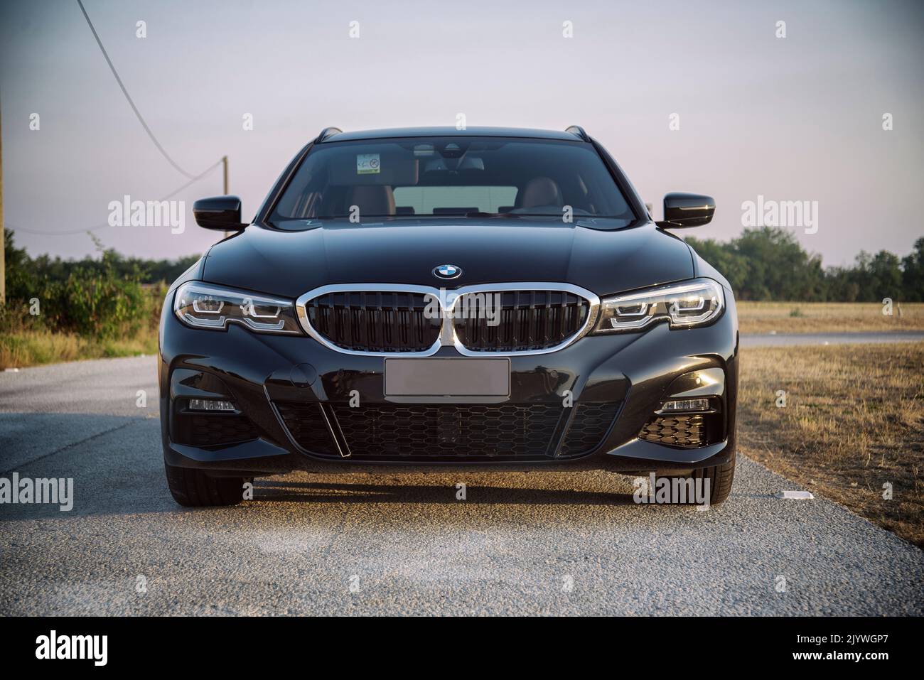 Bmw 320d front view on rural road Stock Photo - Alamy