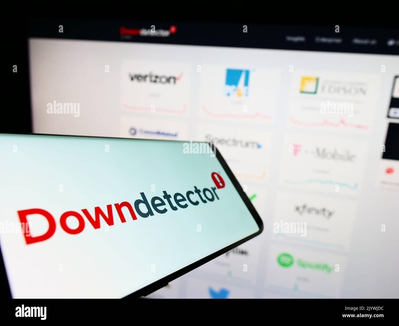 Mobile phone with logo of online platform Downdetector (Ookla LLC) on ...