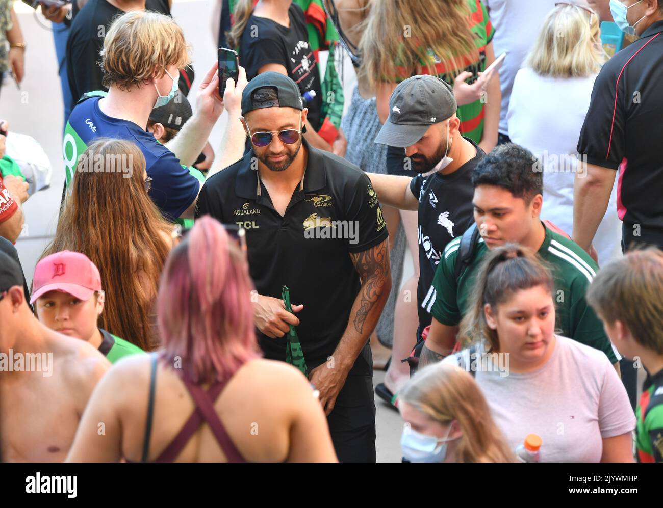 Benji Marshall (centre) is seen meeting fans during the Souths Sydney ...