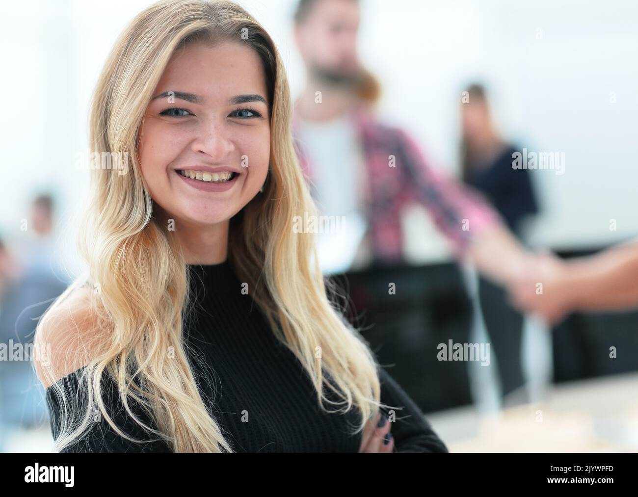 portrait of a young business woman on an office background Stock Photo ...