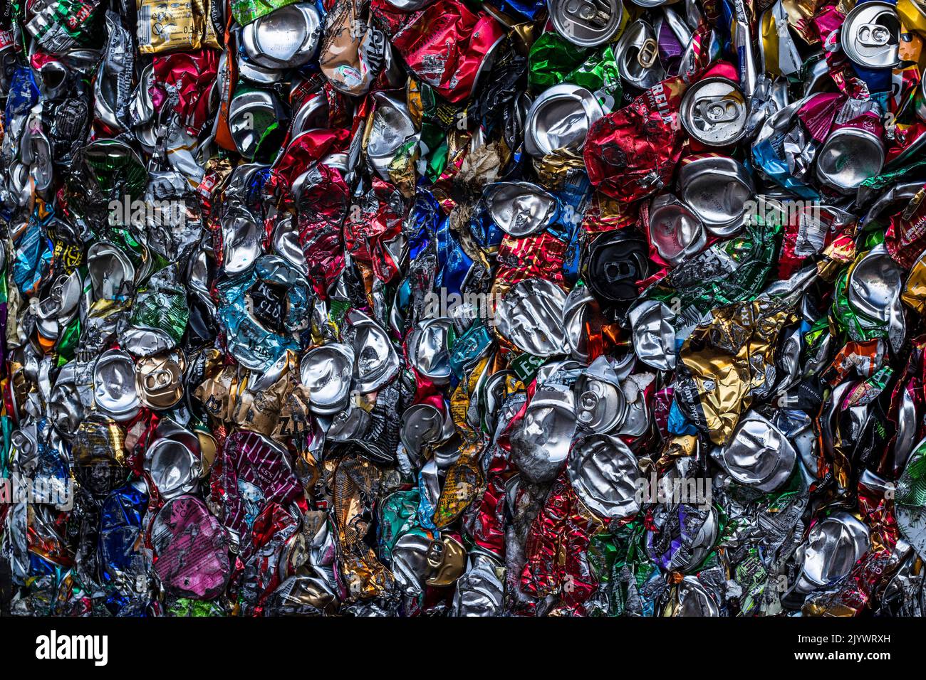 Waste processing, waste sorting. Recycled tin can waste compressed into