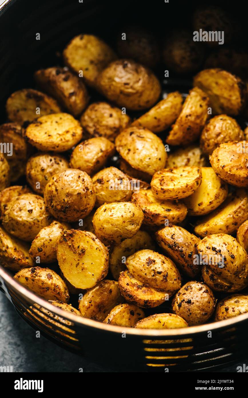 Spicy Baby Yukon Gold Potatoes in an Air Frier Stock Photo