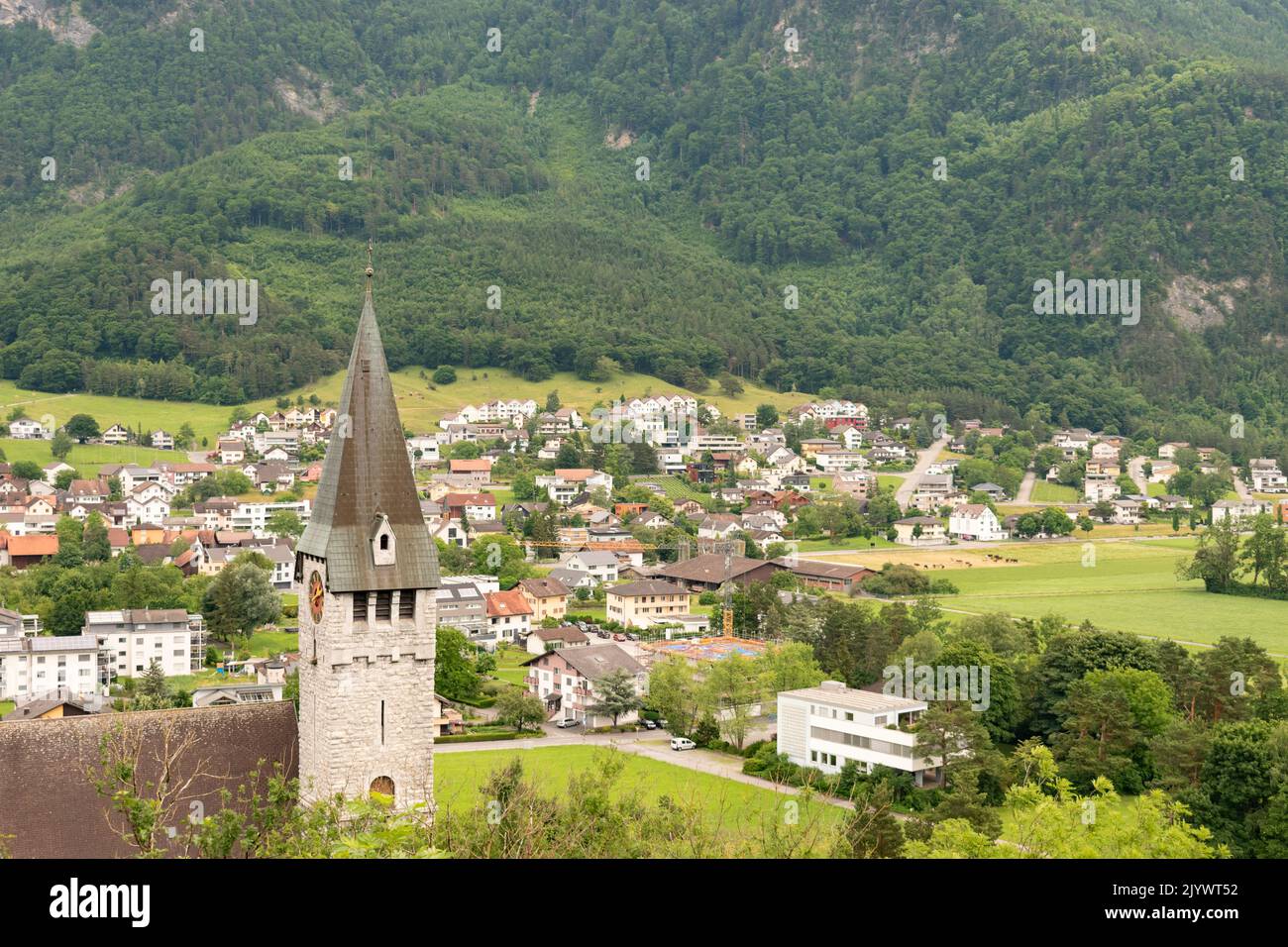 Balzers, Liechtenstein, June 5, 2022 View over the alpine area and the small town on a cloudy day Stock Photo
