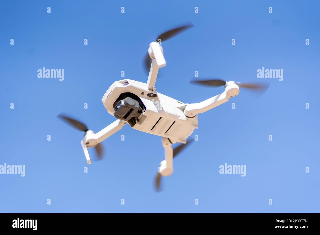 drone flying over the sky capturing images Stock Photo