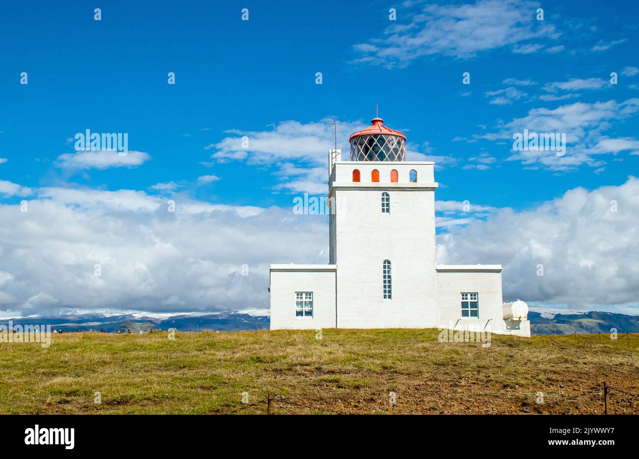 Dyrhólaey Lighthouse on island of Iceland on Europe. Popular tourist sight. Stock Photo