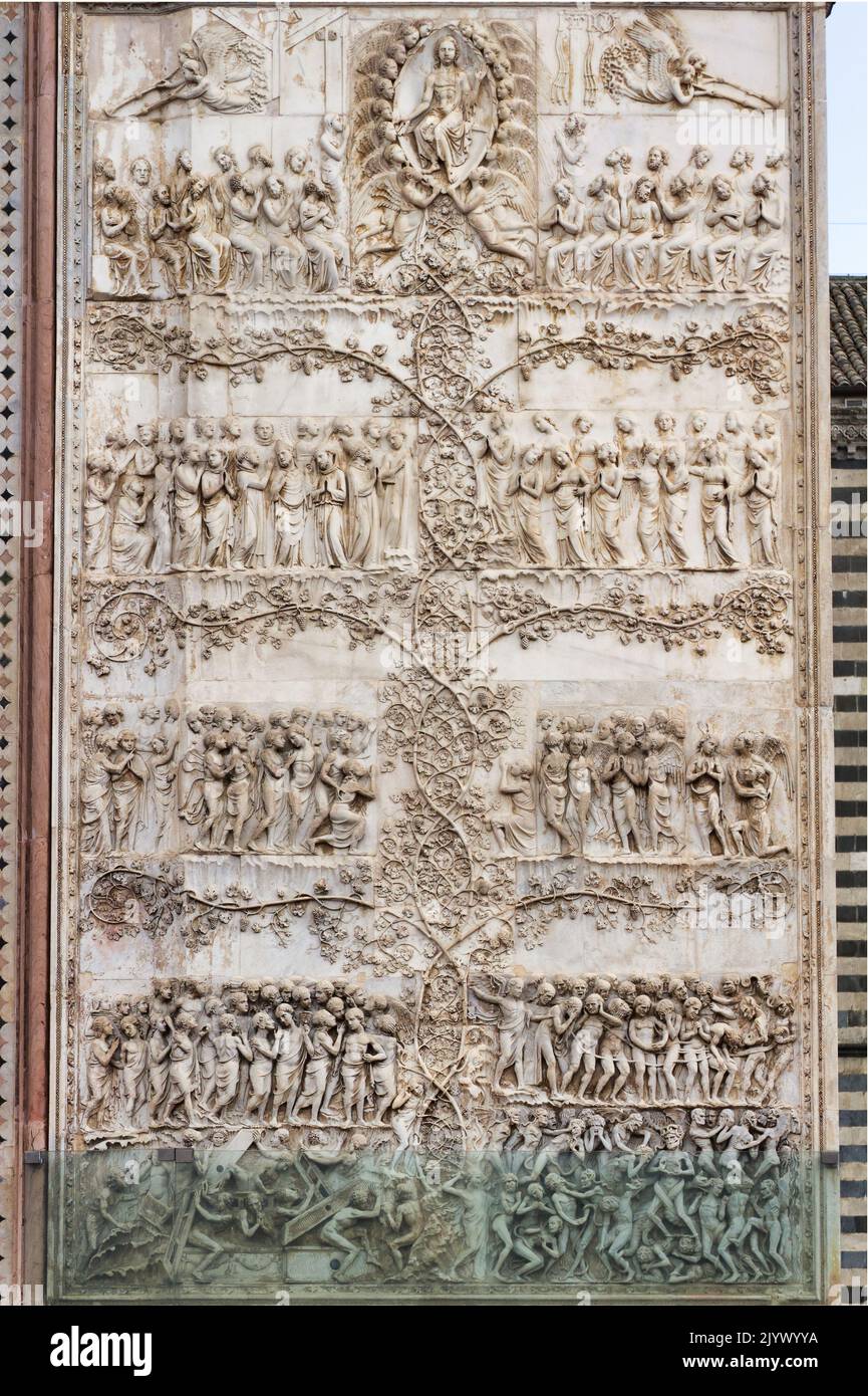 Last Judgement, Apocalypse (by Lorenzo Maitani, 14th century) - detail - Bas-relief from the 4th pillar - Facade of Orvieto cathedral - Umbria - Italy Stock Photo