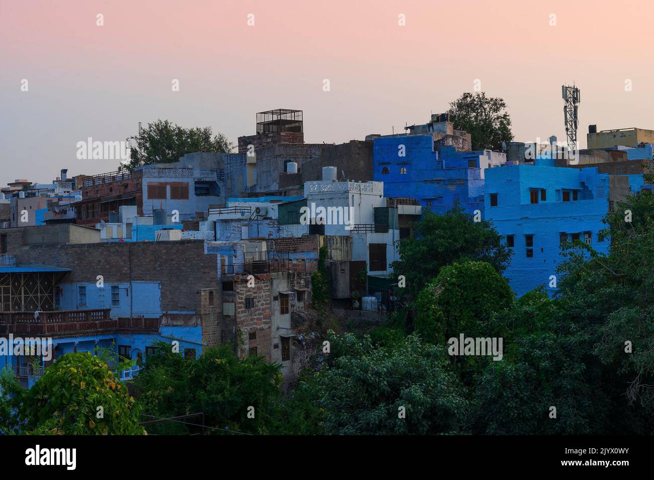 Light of dawn over Jodhpur city, Rajasthan, India. Traditional Blue coloured house. Historically
