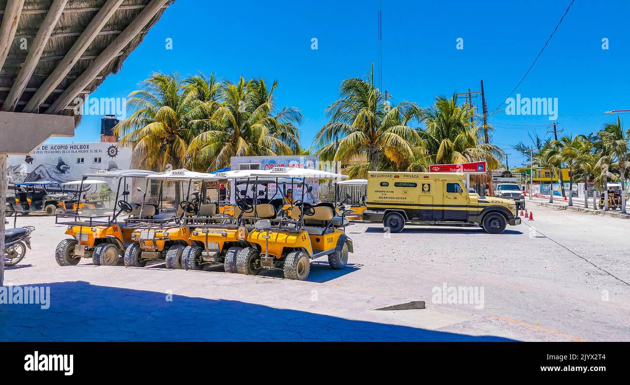 Holbox Mexico 16. May 2022 Buggy car taxi golf cart cars carts at pier