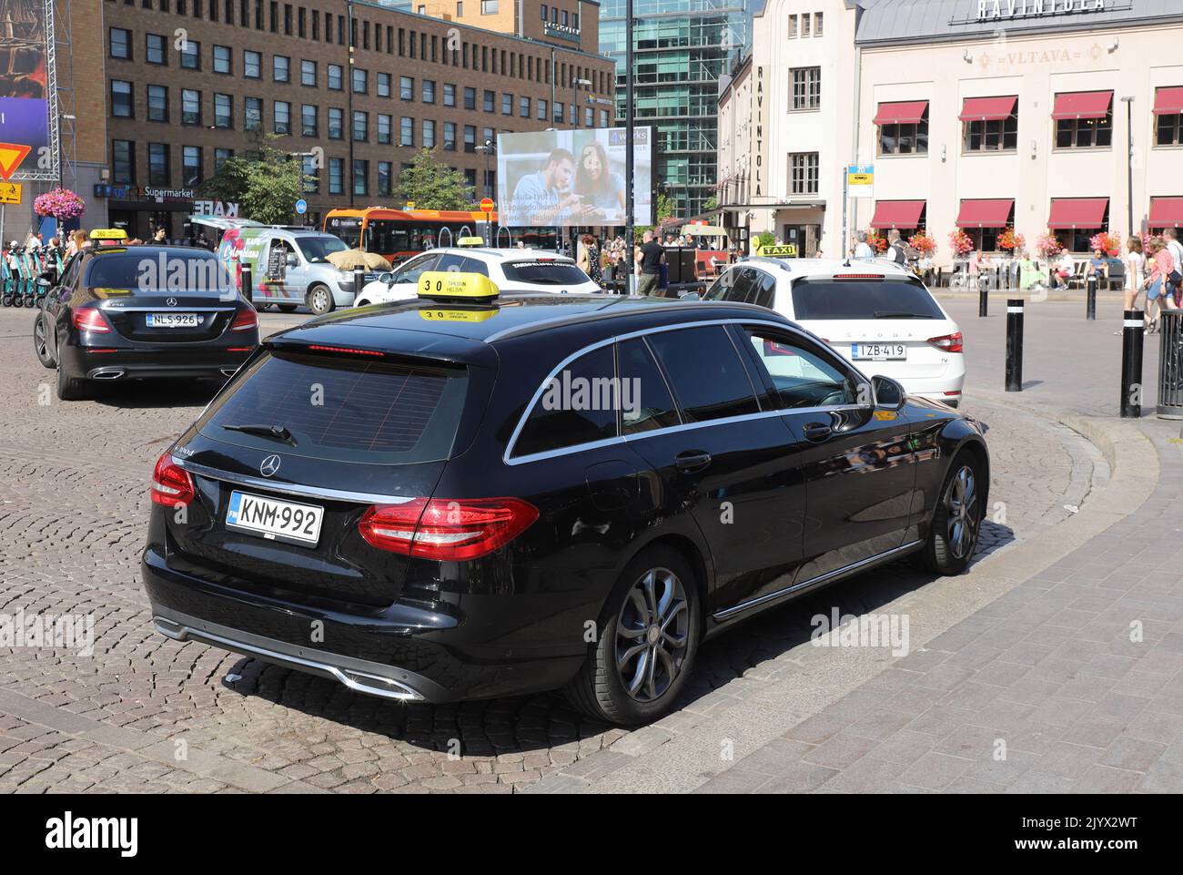Helsinki, Finland - August 20, 2022: Taxis at the taxi rank outside the Helsinki Central railroad station. Stock Photo