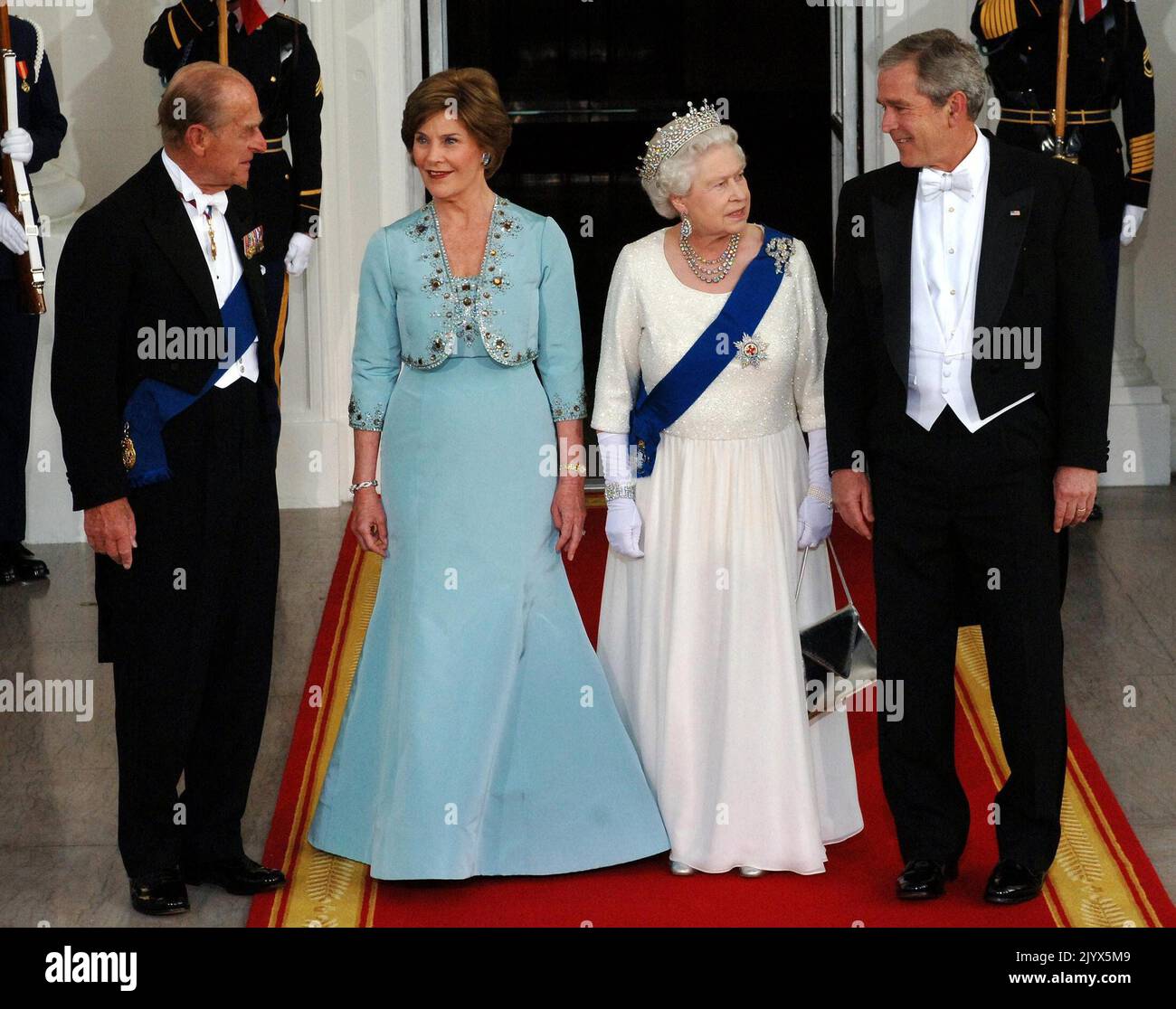 File photo dated 07/05/2007 of Queen Elizabeth II and the Duke of Edinburgh arriving for a state dinner hosted by US President George Bush (right) and his wife Barbara (2nd left) at the White House, Washington DC, on the sixth day of her state visit to the US. The Queen died peacefully at Balmoral this afternoon, Buckingham Palace has announced. Issue date: Thursday September 8, 2022. Stock Photo
