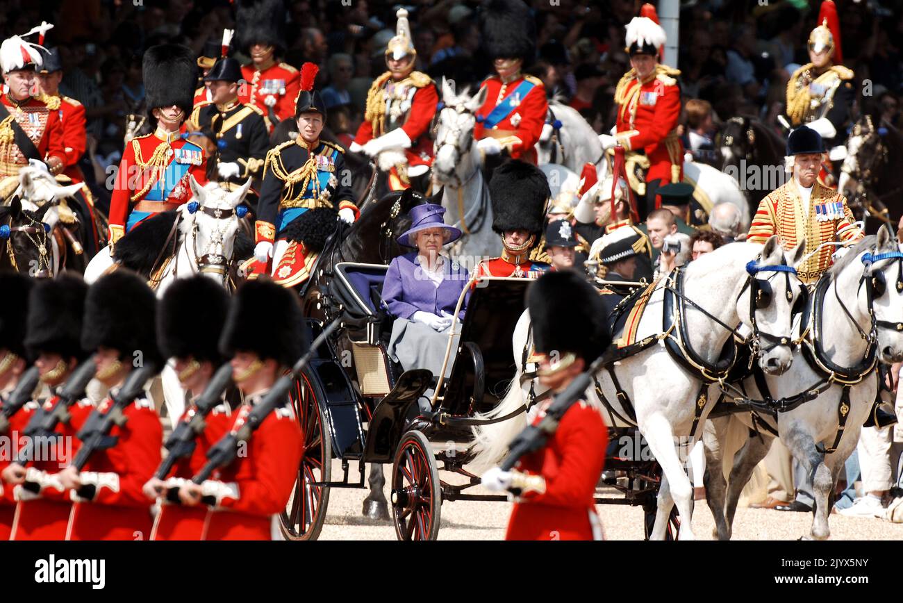 File photo dated 17/06/2006 of Queen Elizabeth II and the Duke of Edinburgh arriving to inspect the troops during the annual Trooping the Colour ceremony at Horse Guards Parade, London. The Queen died peacefully at Balmoral this afternoon, Buckingham Palace has announced. Issue date: Thursday September 8, 2022. Stock Photo