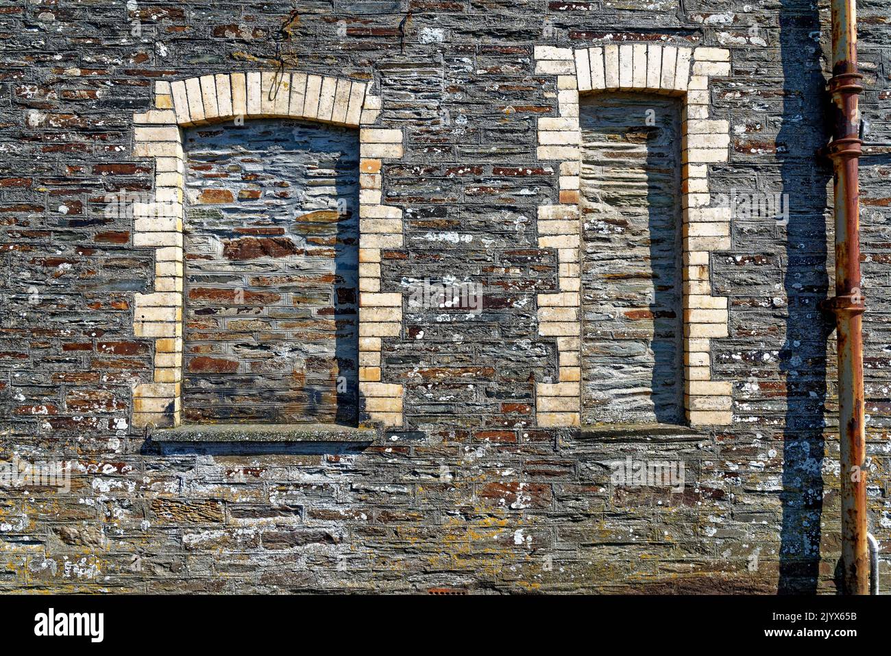 Old window closeup - Beautiful scenic village of Tintagel in Cornwall, England Stock Photo