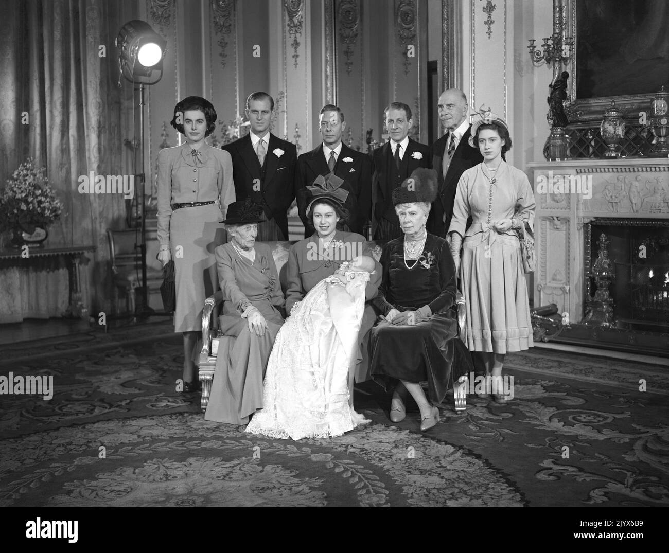 File photo 15/12/1948 of Princess Elizabeth (later Queen Elizabeth II) holding her son, Prince Charles after his christening in Buckingham Palace. With her seated to the left is Dowager Marchioness of Milford Haven, and right is the prince's great grandmother Queen Mary. Godparents standing from left to right; Lady Brabourne, The Duke of Edinburgh (standing proxy for Prince George of Greece), King George VI, David Bowes-Lyon, the Earl of Athlone (who stood proxy for the King of Norway) and Princess Margaret. The Queen died peacefully at Balmoral this afternoon, Buckingham Palace has announced. Stock Photo
