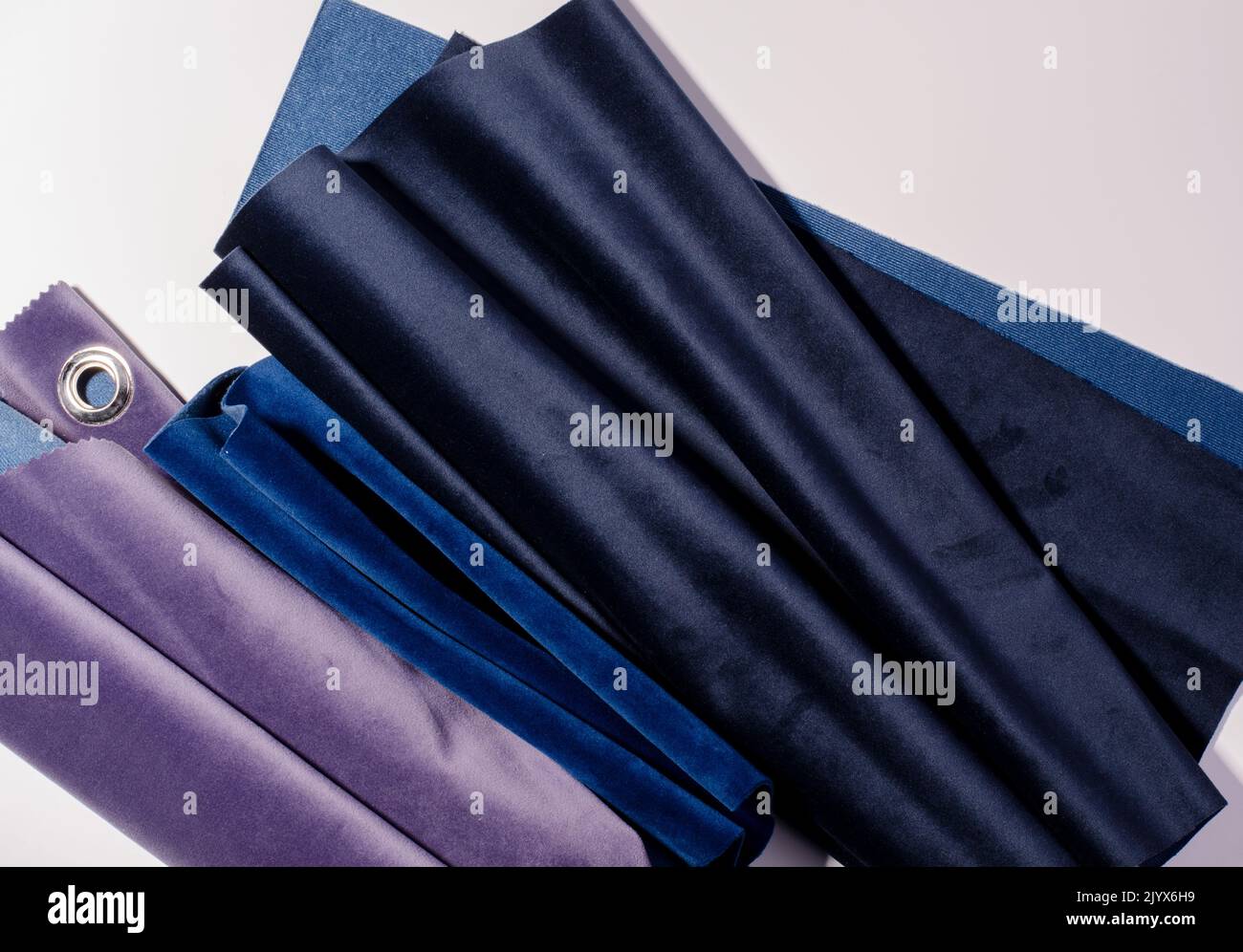 Light Lilac and Pink colors velour textile samples.. Fabric texture background Stock Photo
