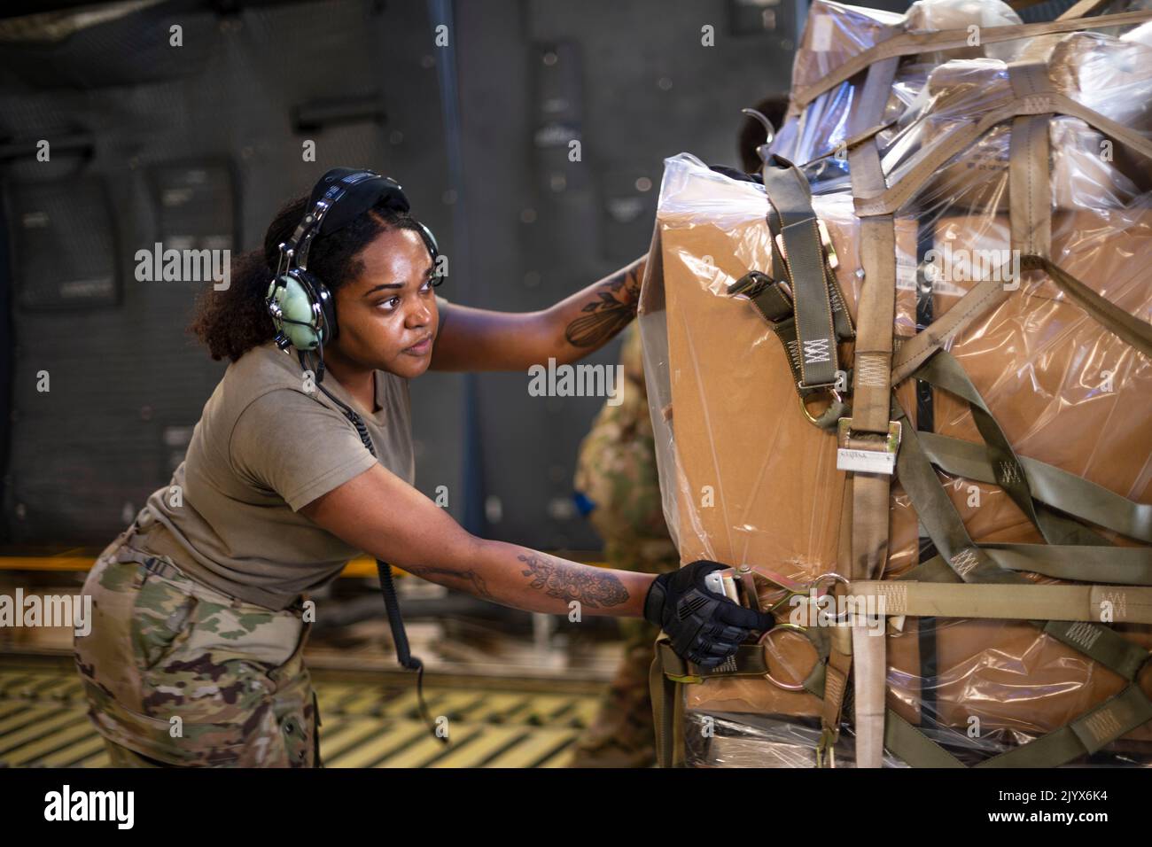 Honduras. 26th Aug, 2022. U.S. Air Force Senior Airman Symone Chur Martin, 22nd Airlift Squadron loadmaster apprentice, pushes a pallet off a C-5M Super Galaxy at Soto Cano Air Base, Honduras, Augustust 26, 2022. The C-5M delivered over 90,000 pounds of humanitarian aid through the Denton Program. The Denton Program allows private U.S. citizens and private organizations to transport humanitarian goods to approved countries in need. Credit: U.S. Air Force/ZUMA Press Wire Service/ZUMAPRESS.com/Alamy Live News Stock Photo