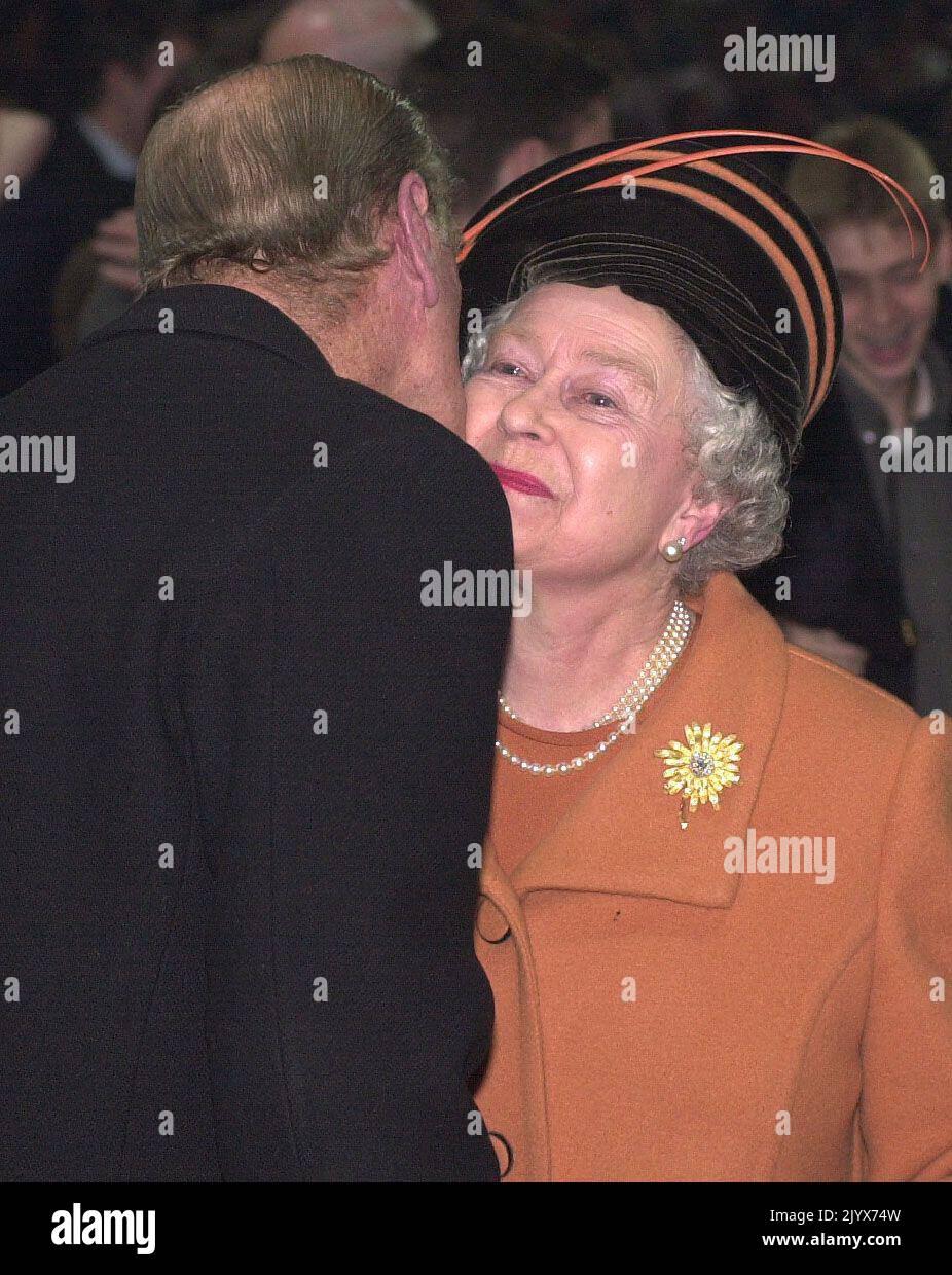 File photo dated 01/01/2000 of the Duke of Edinburgh kissing Queen Elizabeth II during the midnight celebrations at the Millennium Dome in Greenwich in London. The Queen died peacefully at Balmoral this afternoon, Buckingham Palace has announced. Issue date: Thursday September 8, 2022. Stock Photo