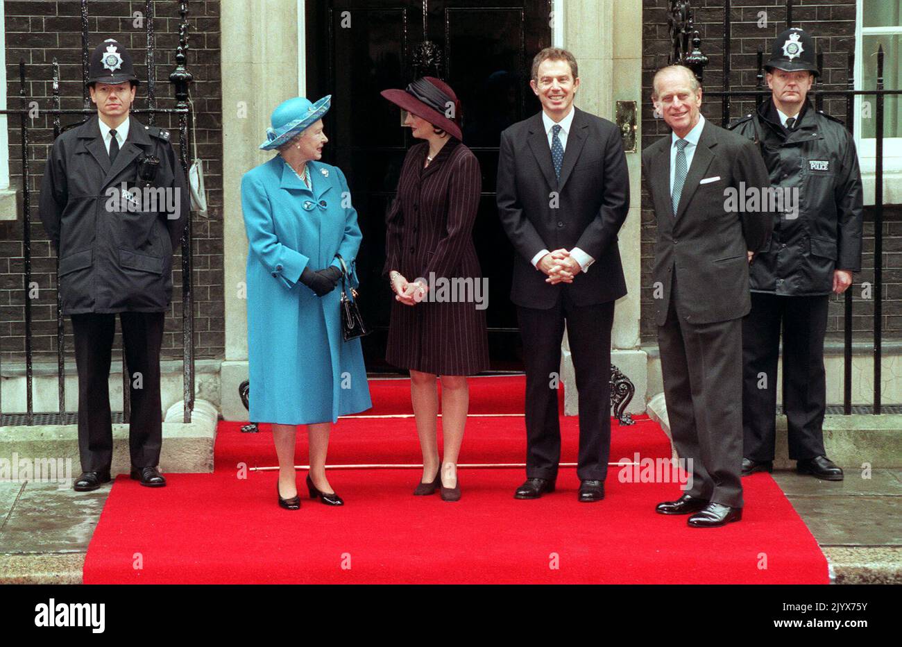 File photo dated 20/11/1997 of Queen Elizabeth II (left) and the Duke of Edinburgh (right) with Cherie Blair and Prime Minister Tony Blair during the royal 50th wedding anniversary walkabout in Downing St, London. The Queen died peacefully at Balmoral this afternoon, Buckingham Palace has announced. Issue date: Thursday September 8, 2022. Stock Photo