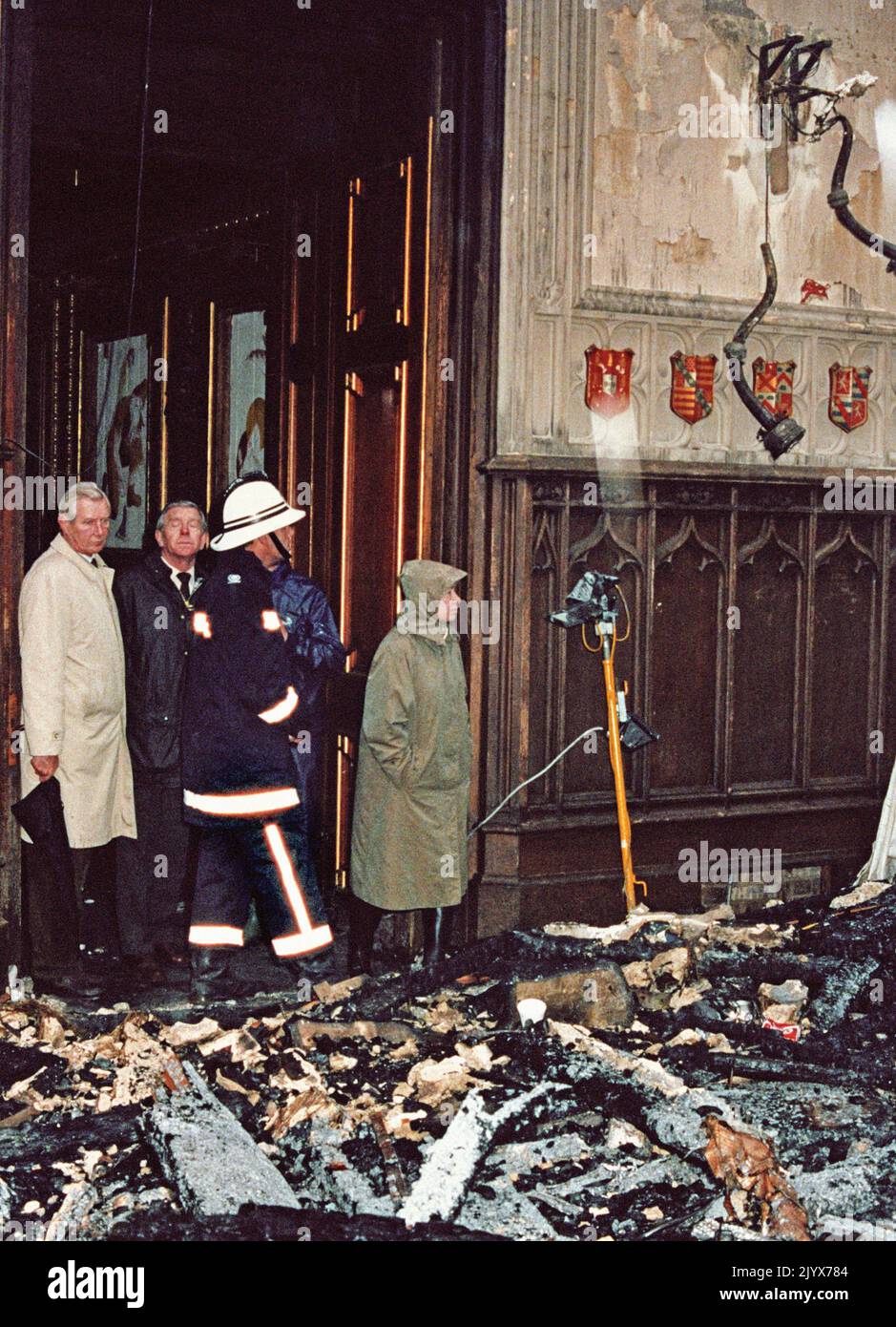 File photo dated 21/11/1992 of Queen Elizabeth II surveying the damage caused by the fire inside Windsor Castle. The Queen died peacefully at Balmoral this afternoon, Buckingham Palace has announced. Issue date: Thursday September 8, 2022. Stock Photo