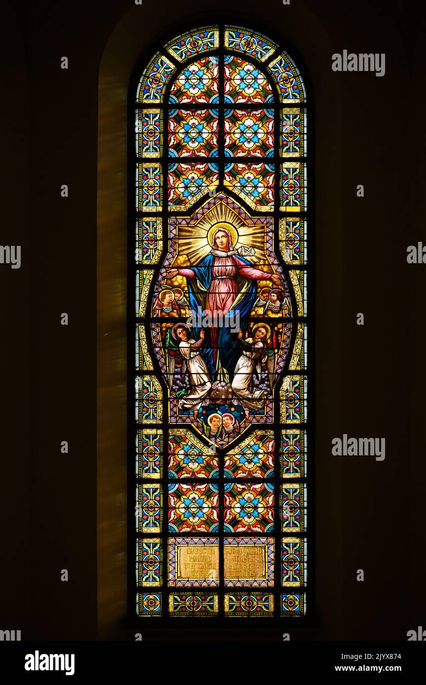 Stained-glass window depicting the Assumption of the Virgin Mary. Blumental church in Bratislava, Slovakia. Stock Photo