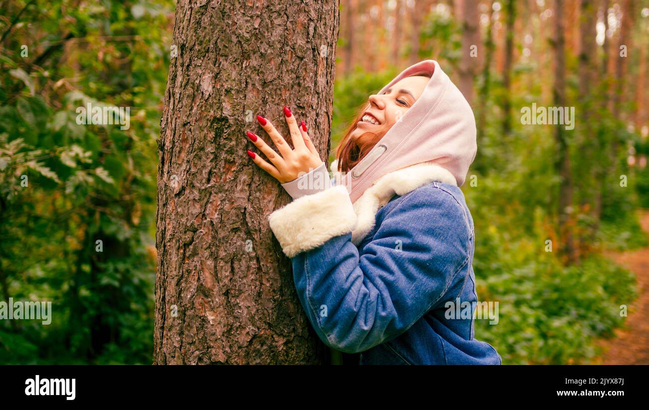 Woman Hand Tree Young woman hugging tree in woodland hi-res stock photography and ...