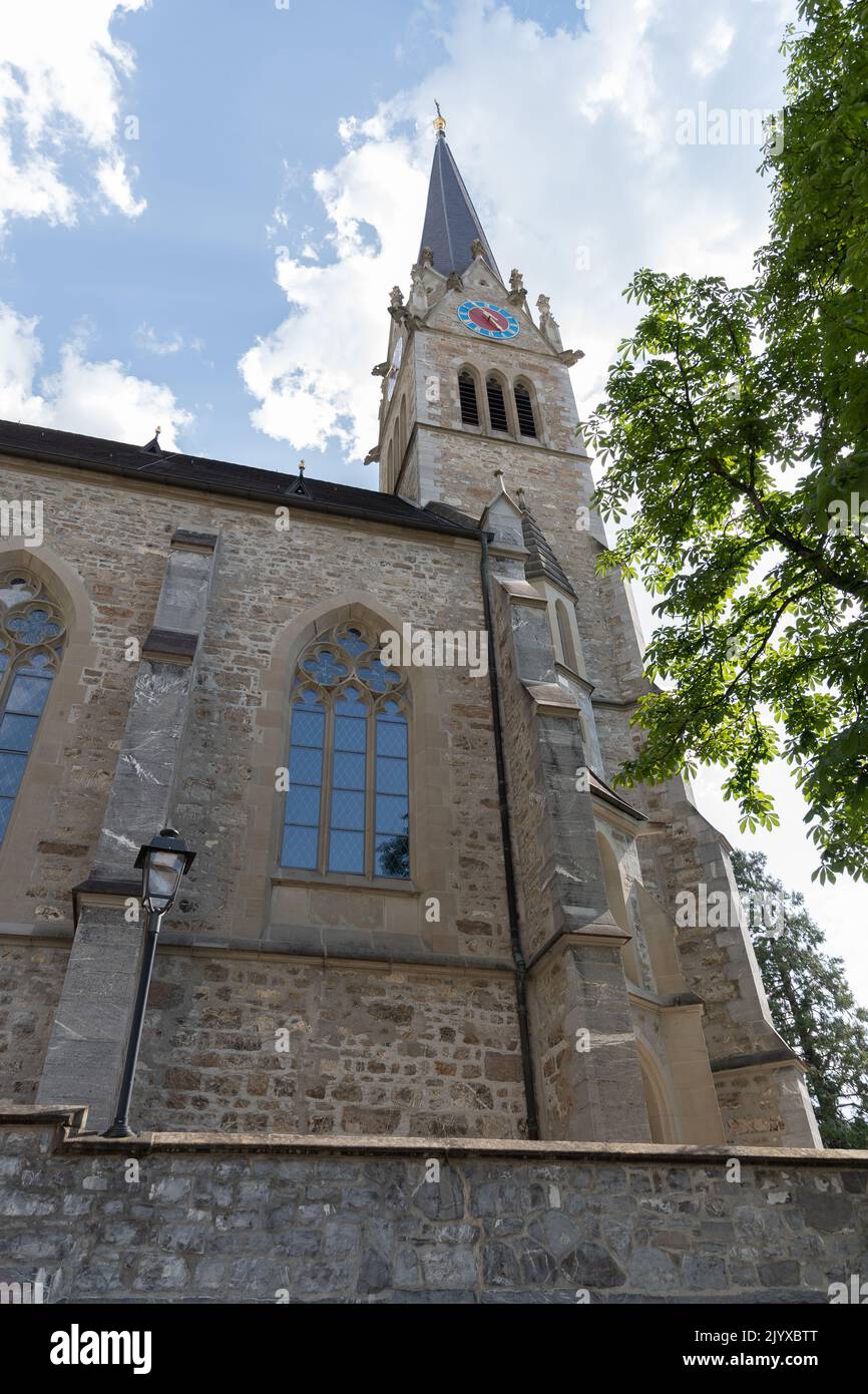 Vaduz, Liechtenstein, June 15, 2022 Historic old Saint Florin cathedral on a sunny day Stock Photo