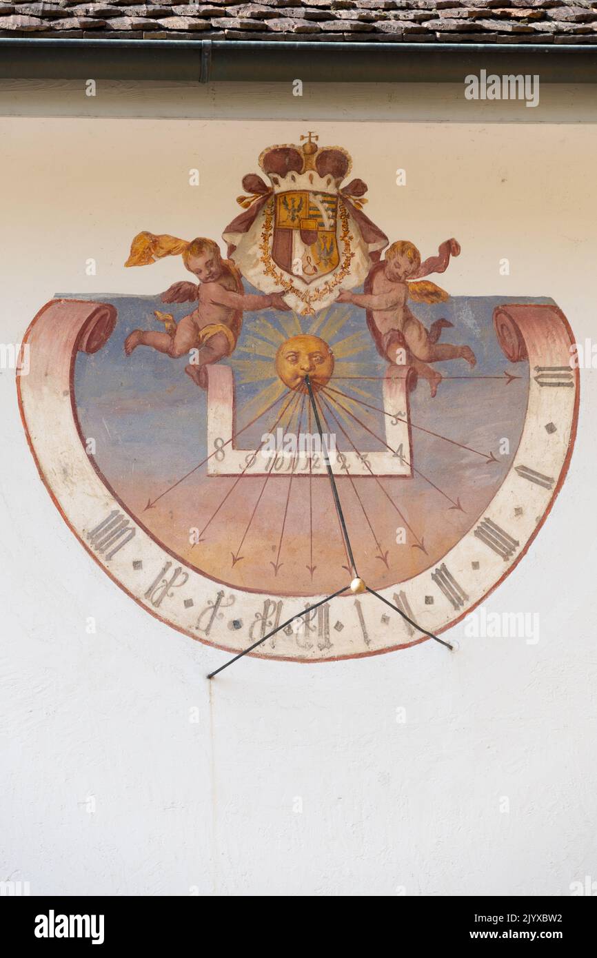 Vaduz, Liechtenstein, June 15, 2022 Historic old sundial painted on a wall Stock Photo