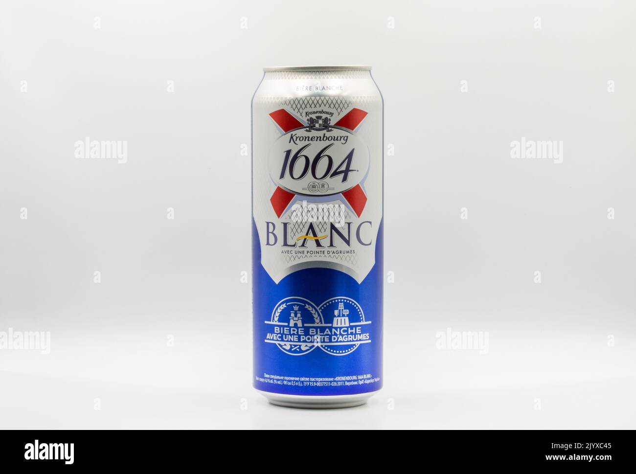Kyiv, Ukraine - June 26, 2021: Studio shoot of Kronenbourg Blanc 1664 wheat beer with citrus can closeup on white. The company is owned by the Carlsbe Stock Photo