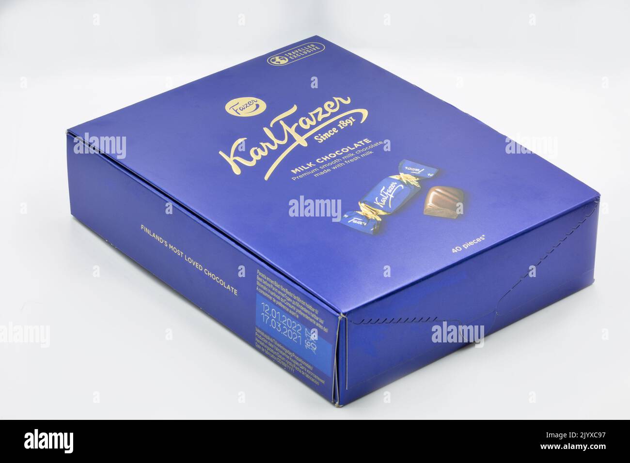 Corfu, Greece - August 15, 2021: Karl Fazer traditional milk chocolates closeup on white. Fazer is one of the largest corporations in the Finnish food Stock Photo