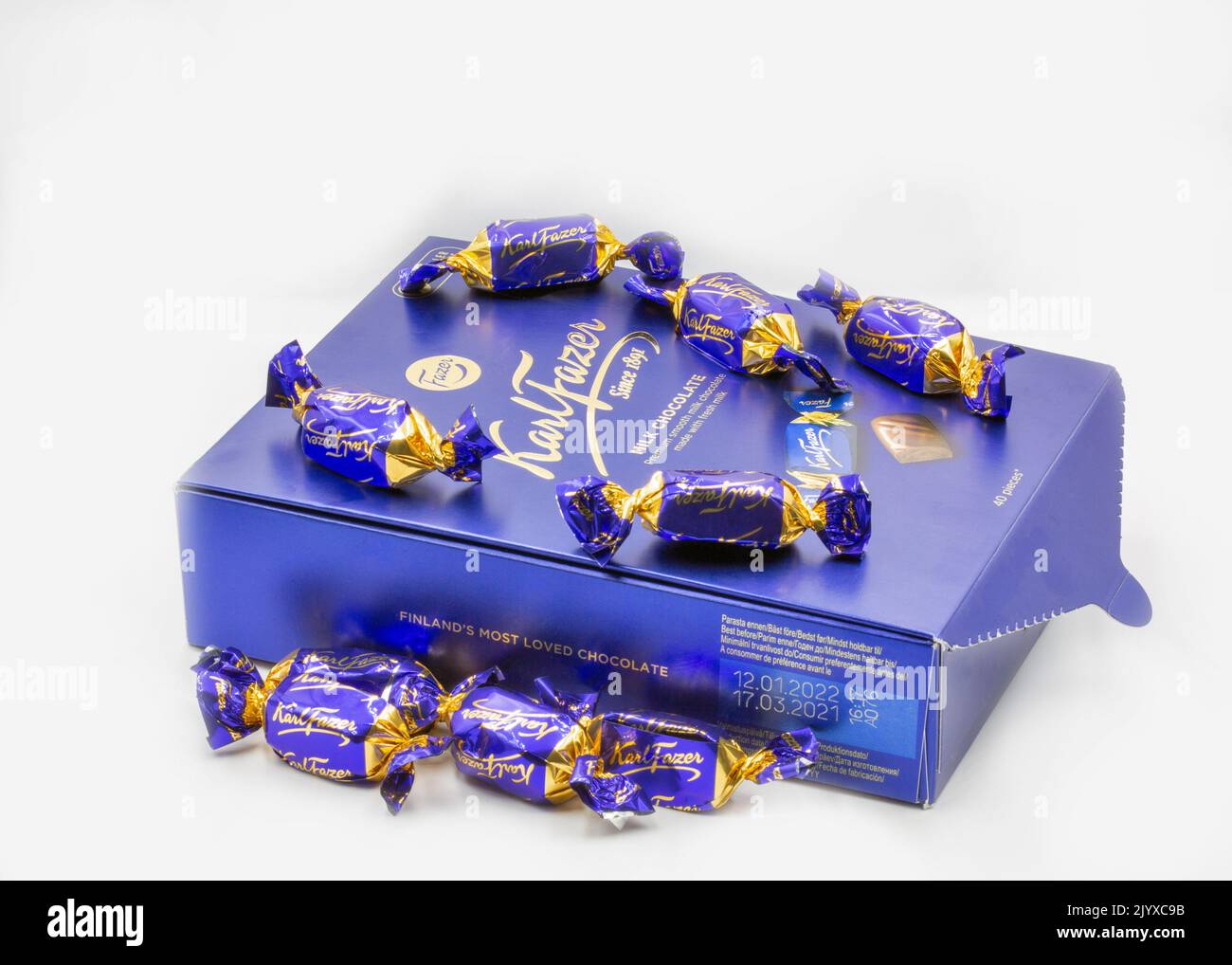 Corfu, Greece - August 15, 2021: Karl Fazer traditional milk chocolates closeup on white. Fazer is one of the largest corporations in the Finnish food Stock Photo