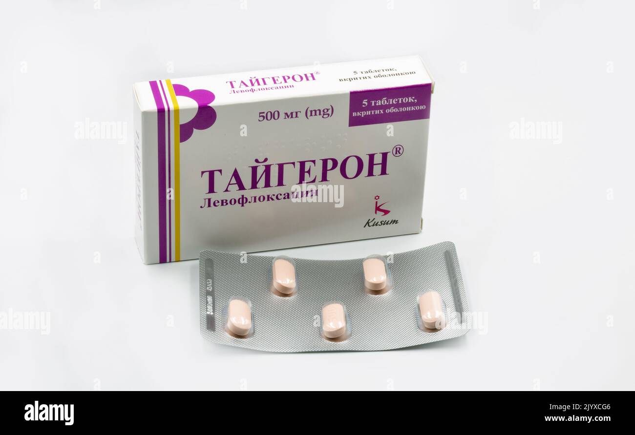 Kyiv, Ukraine - November 21, 2021: Taygeron levofloxacin antibiotic drug tablets blister and box by Kusum closeup on white. It is used to treat bacter Stock Photo