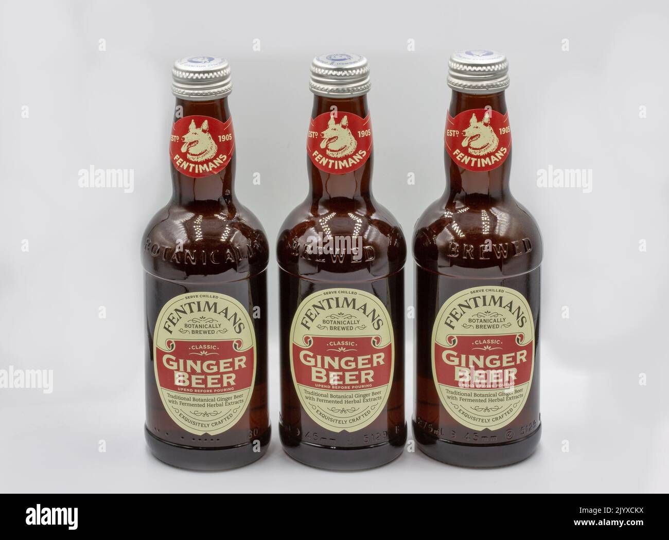 Kyiv, Ukraine - December 26, 2021: Fentimans traditional botanical ginger beer with fermented herbal extracts bottles closeup on white. It is a sweete Stock Photo