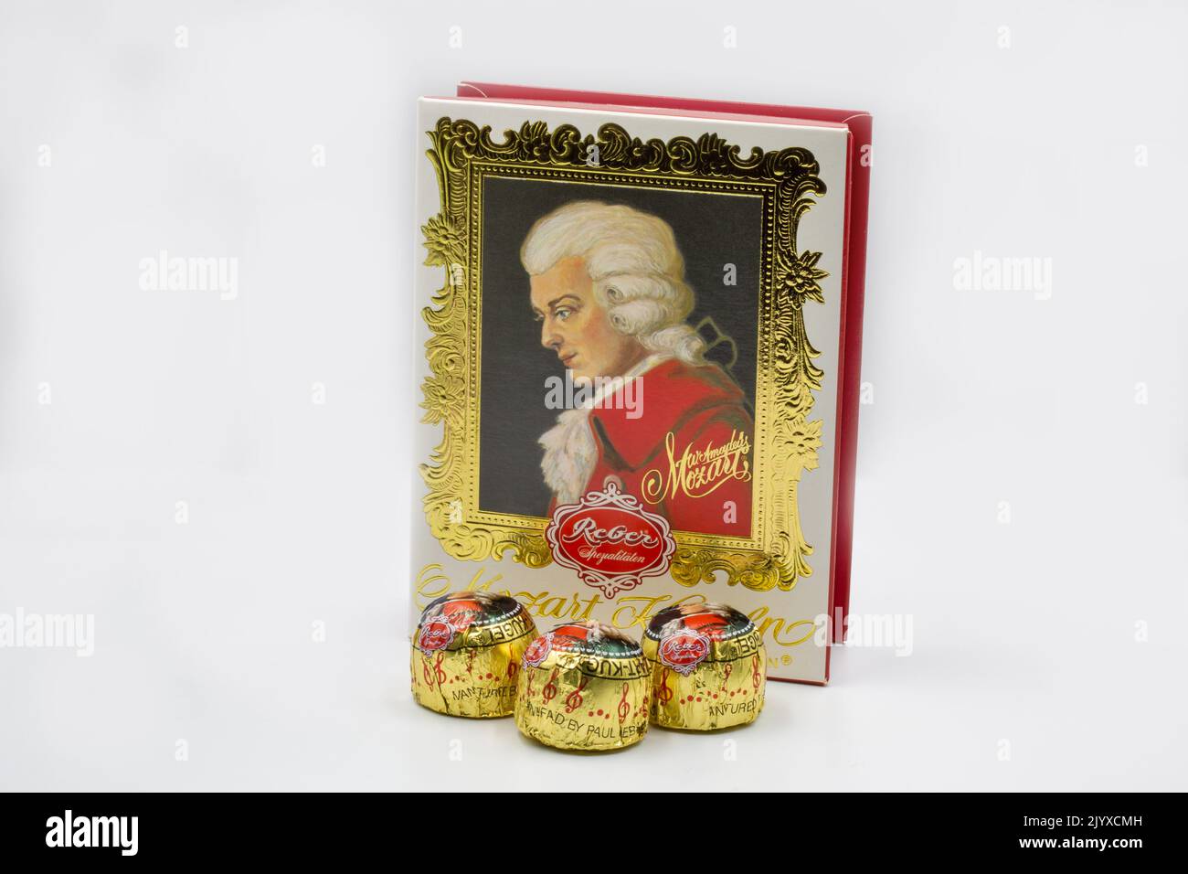 Kyiv, Ukrasine - December 26, 2021: Mozart Kugeln traditional sweets box closeup on white. Largest producer of Mozartkugeln is the German company Rebe Stock Photo