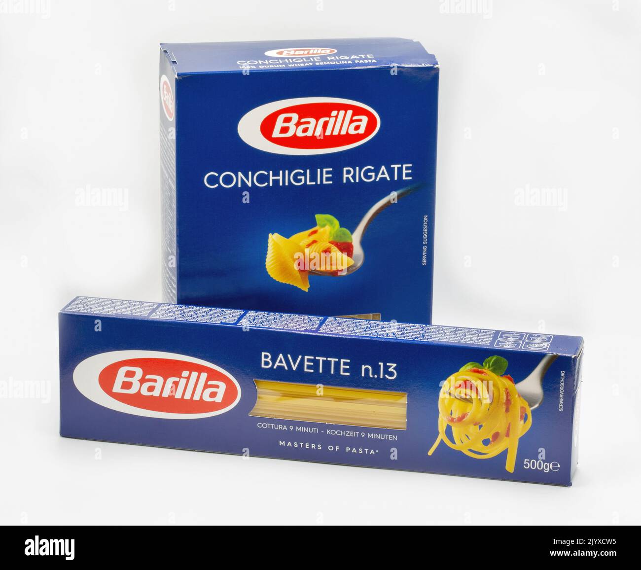 Kyiv, Ukraine - April 24, 2022: Barilla pasta shells Conchiglie Rigate and spaghetti Bavette n.13 packs closeup on white. Barilla S.p.A. is an Italian Stock Photo