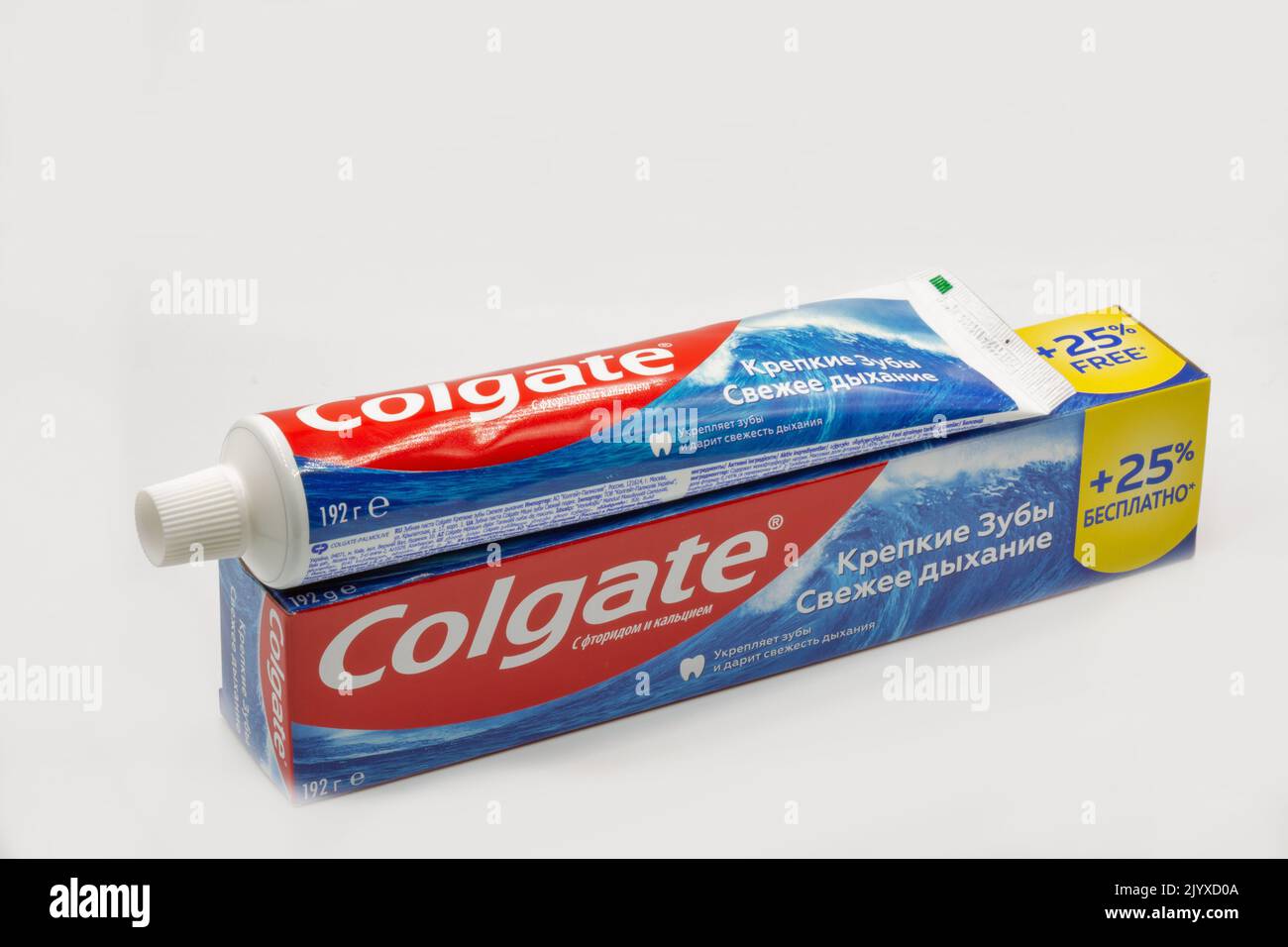 Kyiv, Ukraine - June 18, 2022: Colgate calcium and fluoride toothpaste tube and pack closeup against white. Colgate is a manufacturer of a wide range Stock Photo