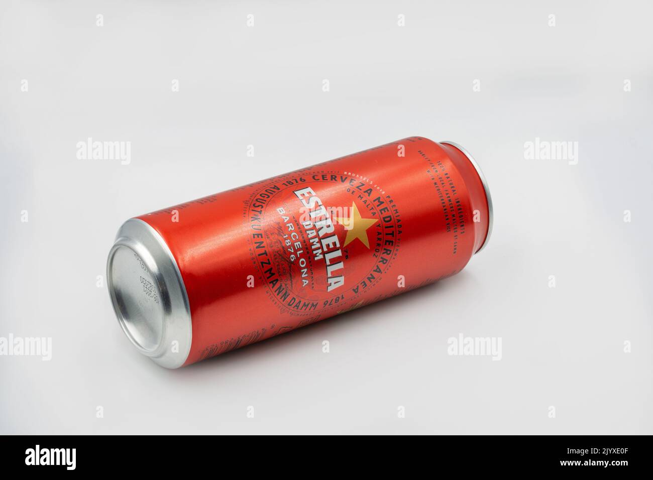 Kyiv, Ukraine - June 10, 2021: Studio shoot of Spanish beer Estrella can from manufacturer Barcelona brewery S.A. Damm closeup on white. Stock Photo