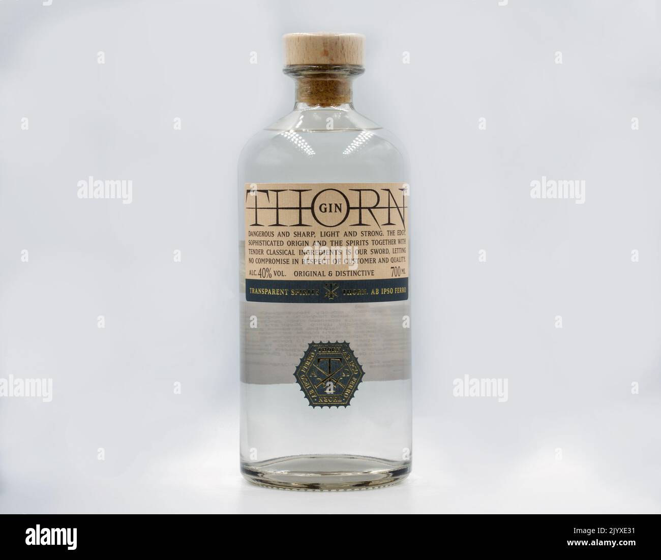 Kyiv, Ukraine - June 10, 2021: Lithuanian Thorn gin bottle closeup against white. Gin is a distilled alcoholic drink that derives its predominant flav Stock Photo
