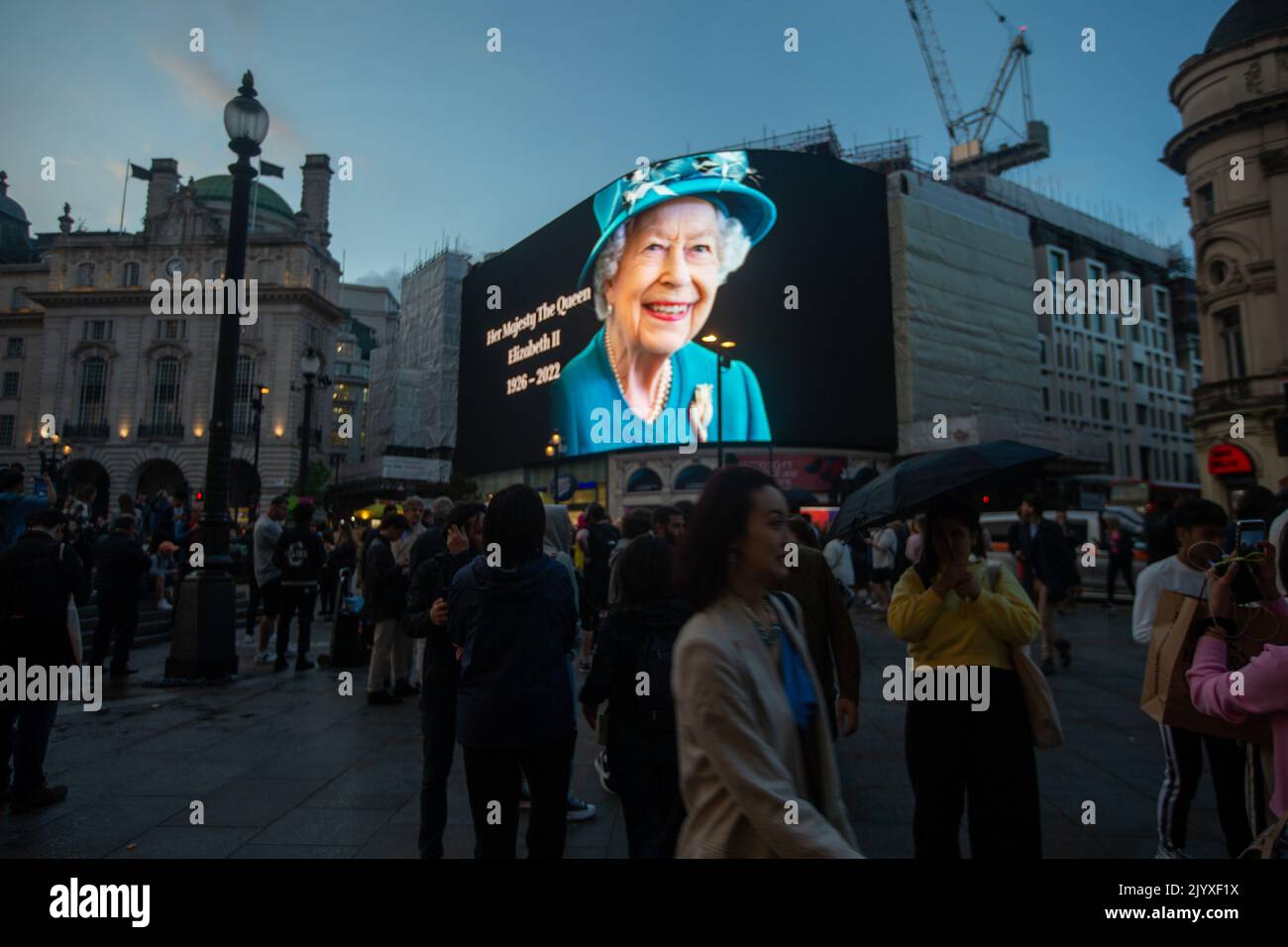 London, England, UK. 8th Sep, 2022. A tributet to Queen Elizabeth II is on display on giant screen in Piccadilly Circus after her death announcement. (Credit Image: © Tayfun Salci/ZUMA Press Wire) Stock Photo