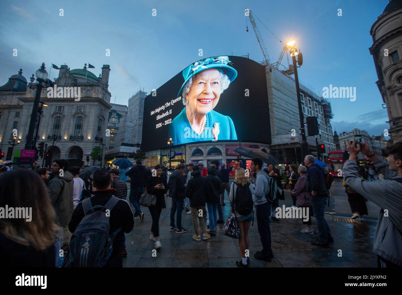 London, England, UK. 8th Sep, 2022. A tributet to Queen Elizabeth II is on display on giant screen in Piccadilly Circus after her death announcement. (Credit Image: © Tayfun Salci/ZUMA Press Wire) Stock Photo
