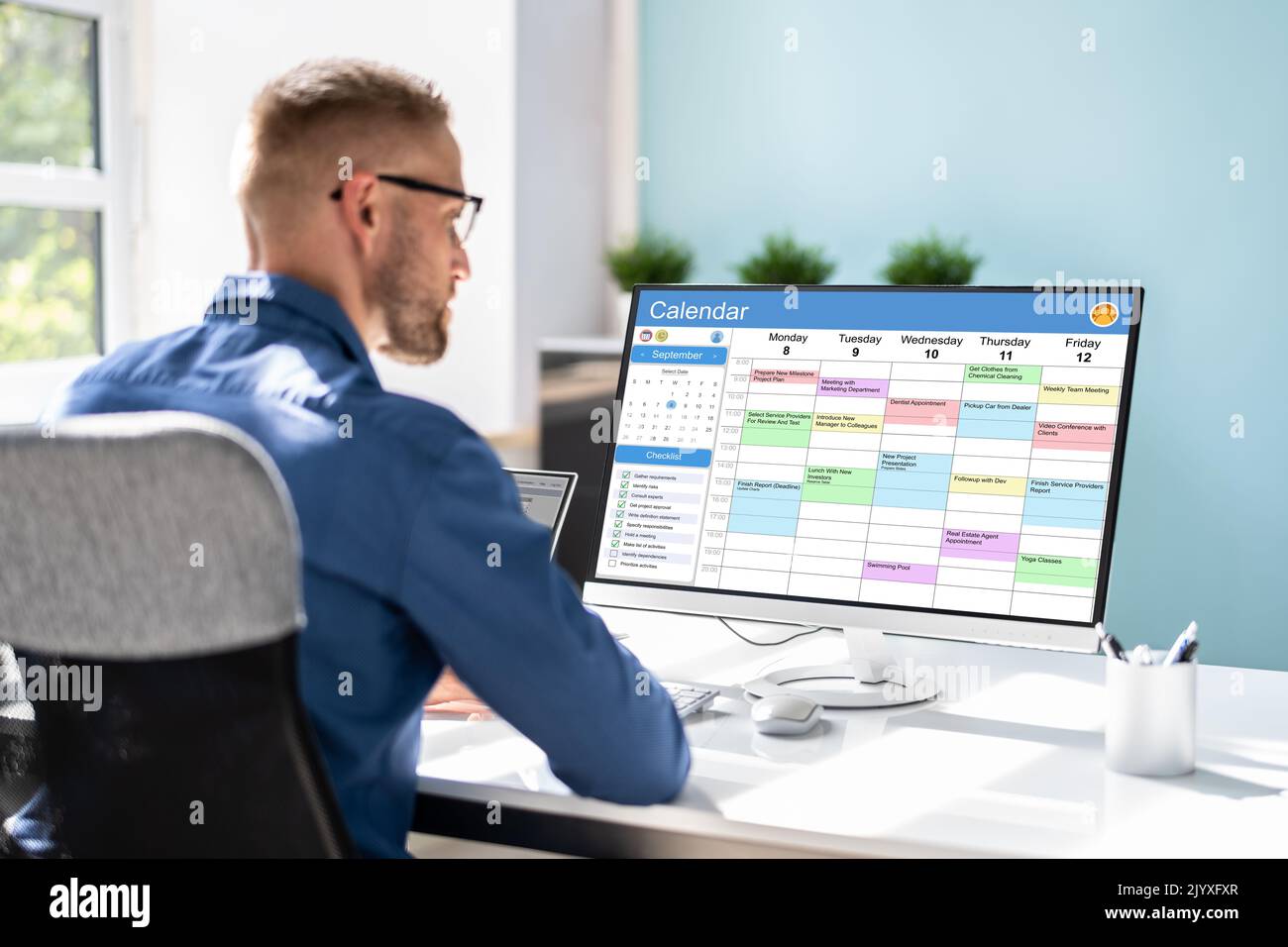 appointment-schedule-planner-and-date-calendar-on-computer-stock-photo