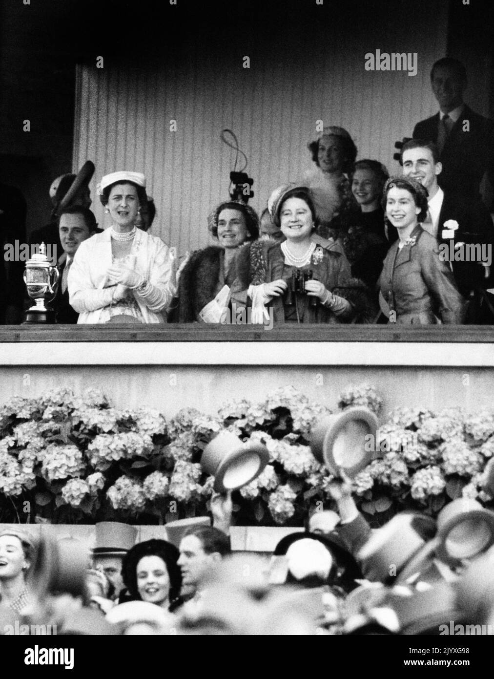 File photo dated 17/6/1953 of Queen Elizabeth II (right) smiling happily as, with other members of the Royal family in the Royal box, she sees her horse 'Choir Boy' win the Royal Hunt Cup at Royal Ascot. Horses, like dogs, were the Queen's lifelong love and she had an incredible knowledge of breeding and bloodlines. Whether it was racing thoroughbreds or ponies, she showed an unfailing interest. Issue date: Thursday September 8, 2022. Stock Photo