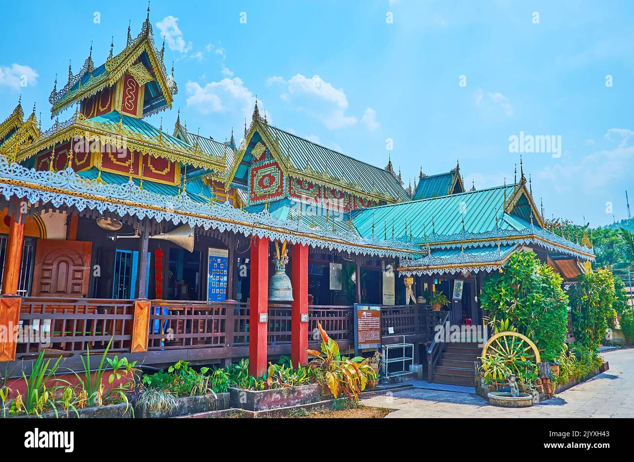 The facade and multi-tired roof of the main viharn of Wat Chong Klang Temple, Mae Hong Son, Thailand Stock Photo
