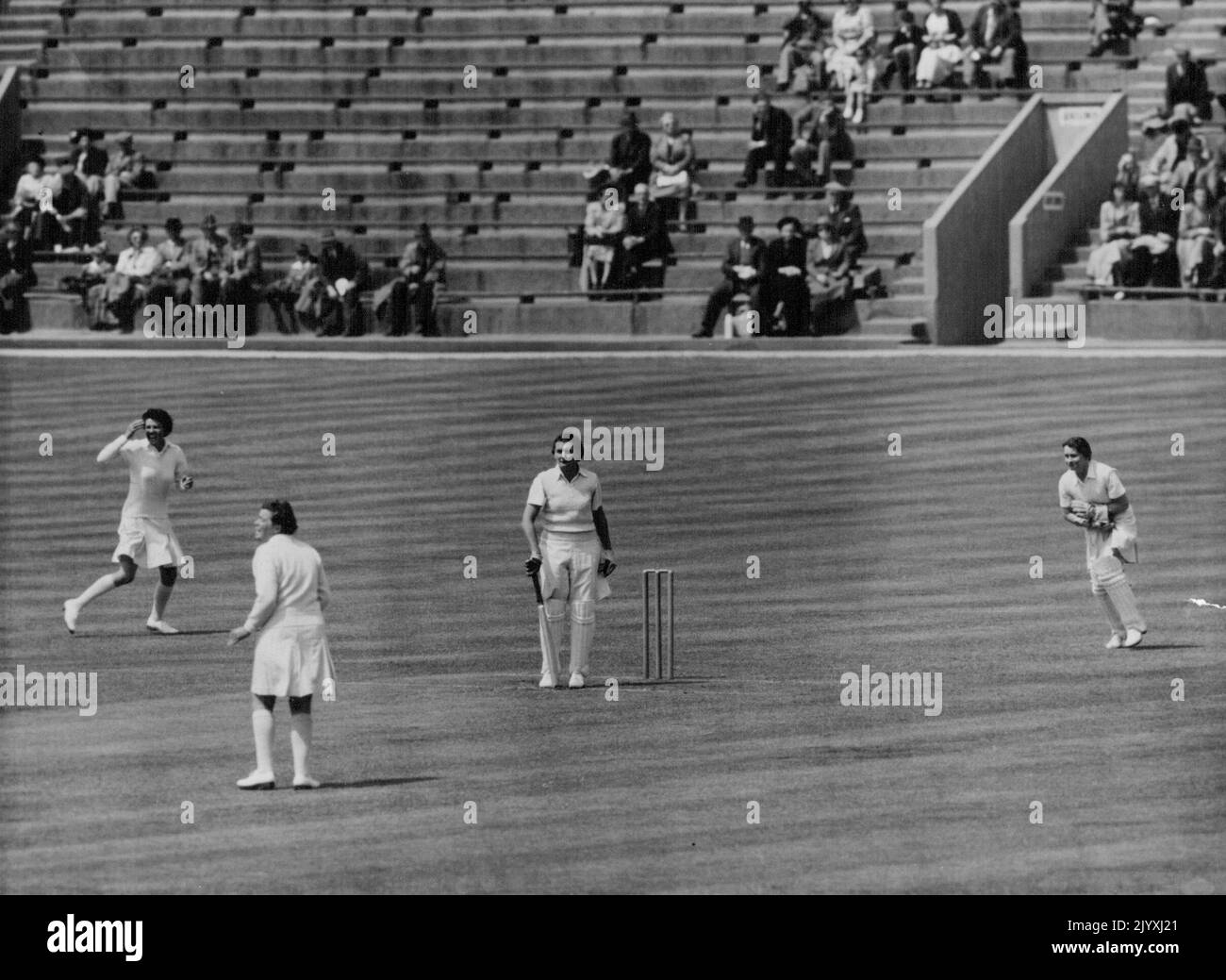 England Lead In Women's Test -- J. Schmidt being caught out by M. Lockwood (England), Extreme Right. Duggan, not seen in picture, was bowling. Dismissing Australia in four hours 20 minutes for 248, England Gained a lead of 35 in the Women's cricket test at Scarborough, Yorkshire June 18. The England bowlers, Particularly MacLagan, who finished with five for 43 in 28 overs, Generally Commanded respect from the Australians who lost J. Schmidt with Only Four Scored. July 02, 1951. (Photo by Associated Press Photo). Stock Photo