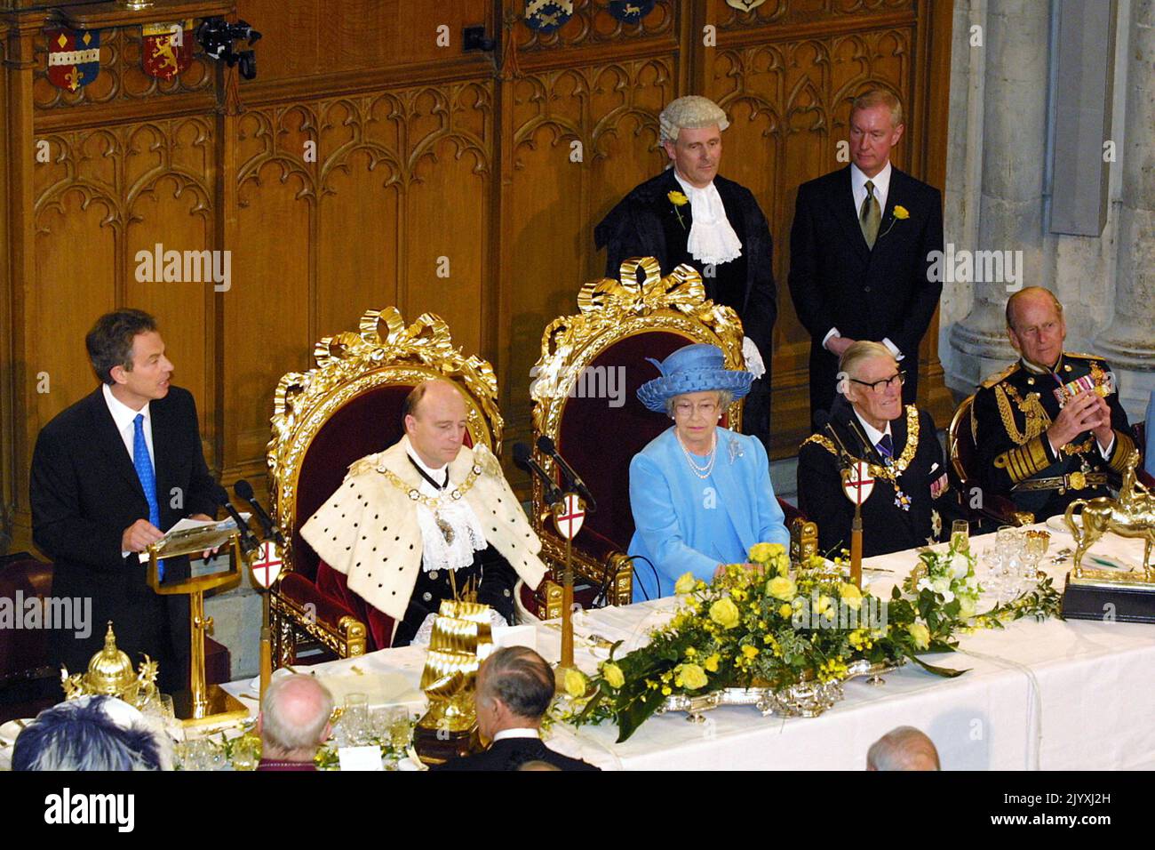 File photo dated 4/6/2002 of Prime Minister Tony Blair speaking during the festival banquet at the Guildhall in London to celebrate Queen Elizabeth II's Golden Jubilee. The Queen toured the UK during her Golden Jubilee year – but 2002 also saw the death of both her sister and her mother. Doubters had insisted the Golden Jubilee would be a flop – the monarchy was no longer relevant and royalists should at last bow to the republicans, they argued. More than one million people turned out on successive days during the June Bank Holiday weekend to party on the capital’s streets and in the regions,  Stock Photo